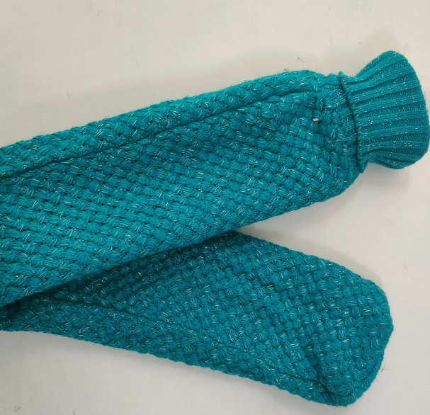 Cable knitted long hot water bottle